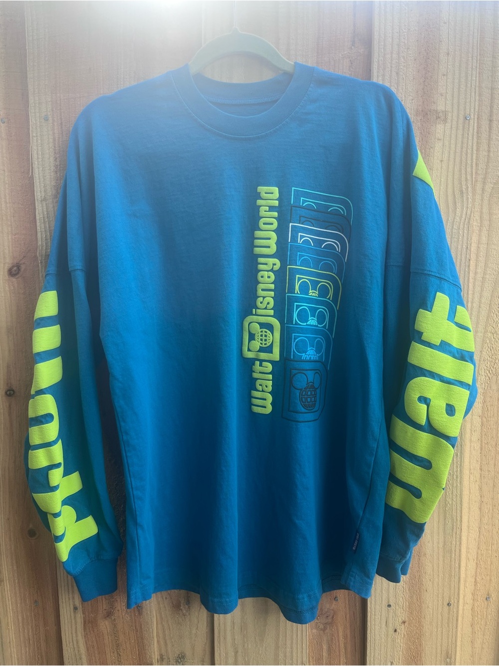 Disney Men's Long Sleeve Spirit Jersey Tee in Teal with Neon Yellow Graphics